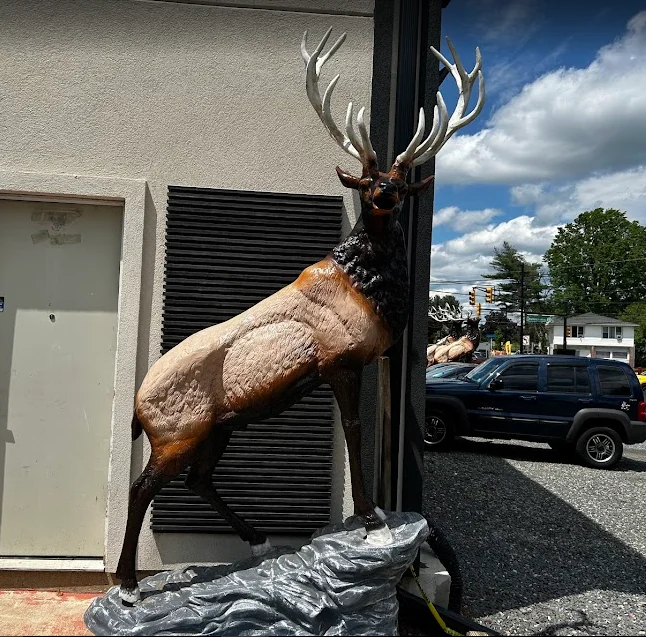 Elk on Stone Facing Right